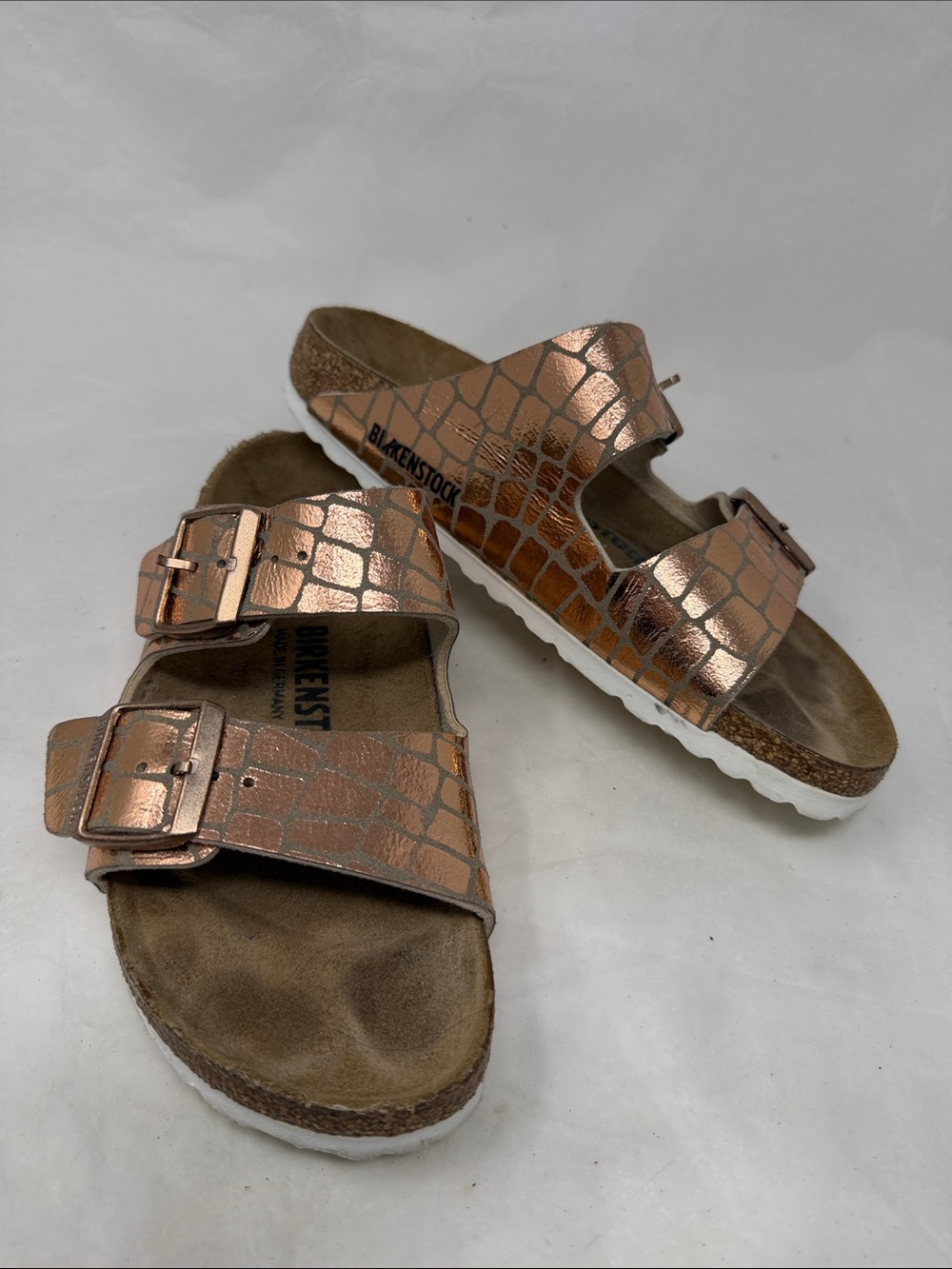 Birkenstock Arizona Two-Strap Sandals in Metallic Rose Gold Croc size 37